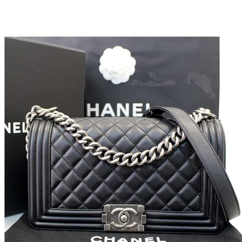 black embossed leather boy chanel bag|beautiful black leather chanel bag.